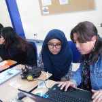 Girls working together on a technology project